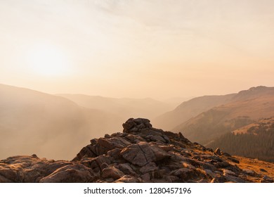 Beautiful Fall Sunset with Trees and Blue Tones in Rocky Mountain National Park - Powered by Shutterstock