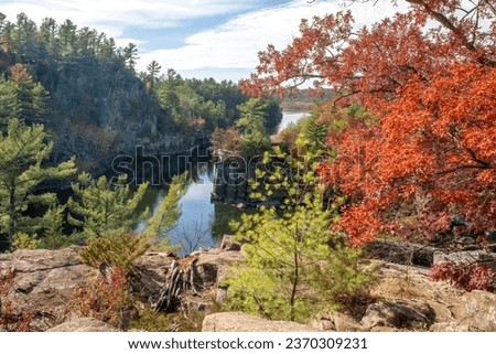 Beautiful fall view of the St. Croix River and Angle Rock at Interstate State Park in St. Croix Falls, Wisconsin and Taylors Falls, Minnesota USA.