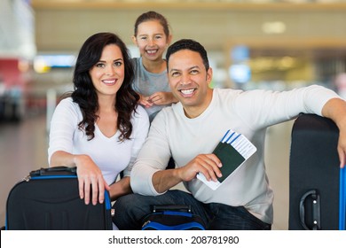 Beautiful Family At Airport Before Boarding 