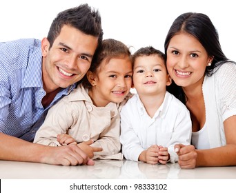 Beautiful family portrait lying on the floor - isolated over a white background