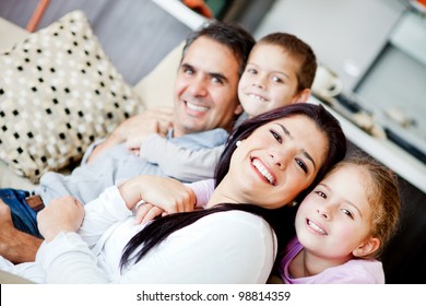 Beautiful Family Portrait Spending Time Together At Home