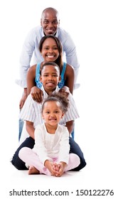 Beautiful family smiling and looking very happy - isolated over white 