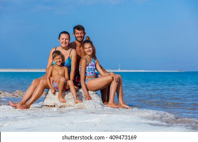 Beautiful Family At The Spa Dead Sea. Israel