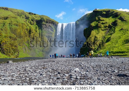 Beautiful and famous Skogafoss waterfall, the biggest waterfall in Skogar, south of Iceland.  Dramatic and picturesque scene. Popular tourist attraction. 