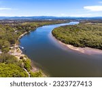Beautiful famous Tinchi Tamba Wetlands, Bald Hills seeing from above, spectacular wide river. Drone shot, Brisbane, Queensland, Australia.	