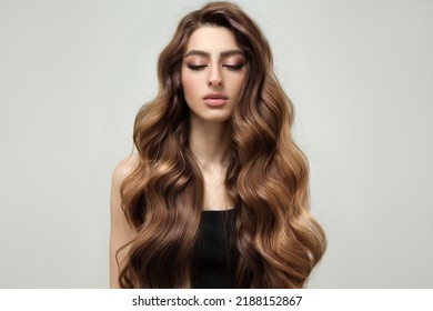 Beautiful Fashion Woman Long Curly Big Curls. Hair And Makeup