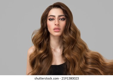 Beautiful Fashion Woman Long Curly Big Curls. Hair And Makeup