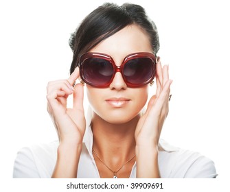 Beautiful Fashion Woman Wearing Sunglasses Over A White Background