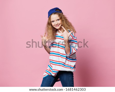 beautiful fashionable girl studio lifestyle clothes pink background model