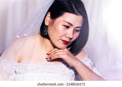 Beautiful Fat Asian Bride Wearing Wedding Dress In Fitting Room