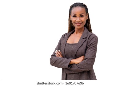 Beautiful female african american business woman CEO in a suit, isolated on white background, standing confidently with arms folded