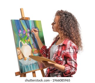 Beautiful female African-American artist painting against white background - Powered by Shutterstock