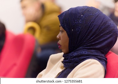 Beautiful Female Afro Hijab Muslim  Student Listen Carefully During Seminar. Study Event, Workshop, Plan Creative Job, Customer Support Service, Case Hear In Court, Leader Performance Concept.