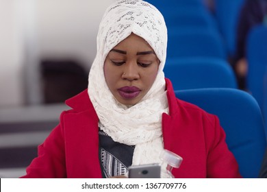 Beautiful Female Afro Hijab Muslim  Student Listen Carefully During Seminar. Study Event, Workshop, Plan Creative Job, Customer Support Service, Case Hear In Court, Leader Performance Concept.