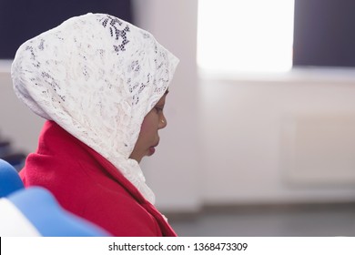 Beautiful Female Afro Hijab Muslim  Student Listen Carefully During Seminar. Study Event, Workshop, Plan Creative Job, Customer Support Service, Case Hear In Court, Leader Performance Concept.