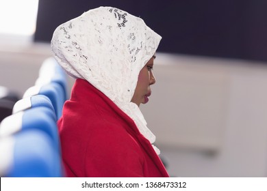 Beautiful Female Afro Hijab Muslim  Student Listen Carefully During Seminar. Study Event, Workshop, Plan Creative Job, Customer Support Service, Case Hear In Court, Leader Performance Concept.