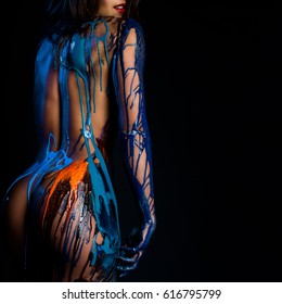 beautiful female body covered with paint