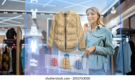 Beautiful Female Customer Using 3D Augmented Reality Digital Interface in Modern Shopping Center. Shopper is Choosing Fashionable Bags, Stylish Garments in Clothing Store. Futuristic VFX UI Concept. - Powered by Shutterstock