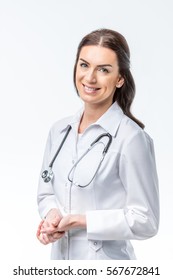 Beautiful Female Doctor With Stethoscope Smiling At Camera Isolated On White