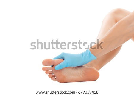 Beautiful female feet at spa salon