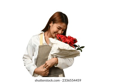 Beautiful female florist smelling red roses with closed eyes isolated on white background - Powered by Shutterstock