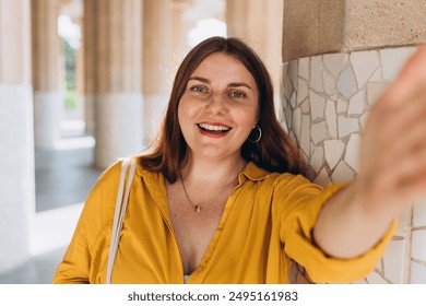 Beautiful female in Gaudi garden, Spain, Barcelona. Young traveling woman taking selfie outdoors. Concept of travel, tourism and vacation in city. Hypostyle hall - Powered by Shutterstock