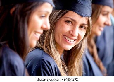 Beautiful Female Graduate Standing Out From A Group Of Students