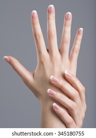 Beautiful Female Hands With French Manicure On Nails