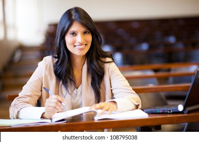 beautiful female indian college girl in lecture hall
