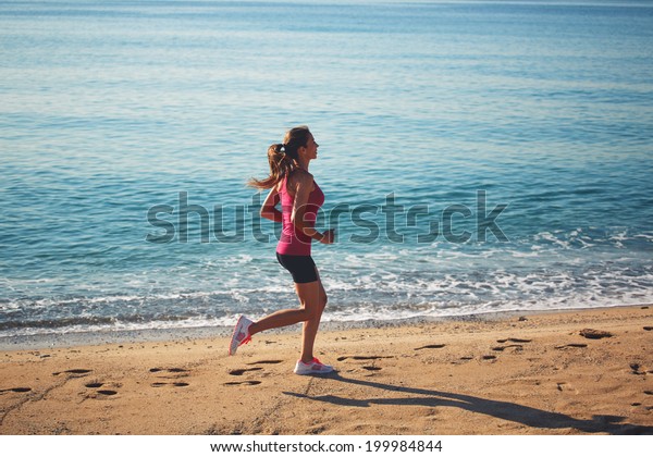 Beautiful Female Jogger Runs Along Sea Stock Photo 199984844 Shutterstock