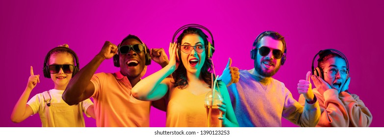 Beautiful female and male models isolated on pink neon lights studio background. Astonished woman and men. Facial expression, summer, resort, summertime or weekend concept. Trendy colors. Collage. - Shutterstock ID 1390123253
