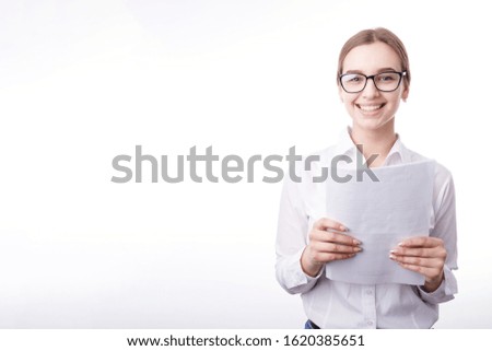 Beautiful Female Office Employee Posing With Papers