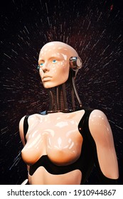 A beautiful female robot against the background of a space, technological explosion. Android in headphones. Futuristic cyborg. Artificial Intelligence. Blue eyes. Quantum computer. Carbon.