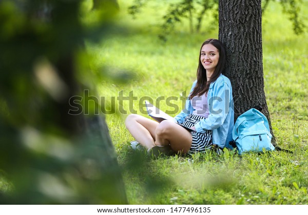 Beautiful Female Student Sitting Under Tree Stock Photo 1477496135 ...