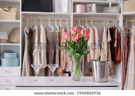 Beautiful female wardrobe.  Vintage clothing rental concept. Women's space. pleasant things  party preparation. Small luxury boutique showroom fashion shop.  hen-party