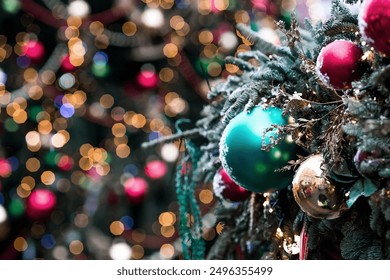 Beautiful festive decorations on the Christmas tree. Close-up. Beautiful Christmas background. The concept of decorations and decor for the new year. New Year's Card 2025 - Powered by Shutterstock