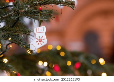 Beautiful festive decorations on the Christmas tree. Close-up. Beautiful Christmas background. The concept of decorations and decor for the new year. New Year's Card 2025 - Powered by Shutterstock