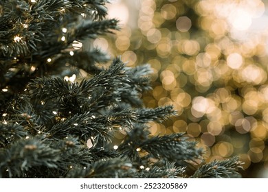 Beautiful festive decorations on the Christmas tree. Close-up. Beautiful Christmas background. The concept of decorations and decor for the new year. New Year's Card 2025 - Powered by Shutterstock