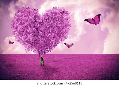 Beautiful field with heart shape tree and butterflies. Abstract pink landscape background.