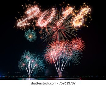 Beautiful firework display for celebration on the river with sparkle of 2018, New year and holidays concept. - Shutterstock ID 759613789