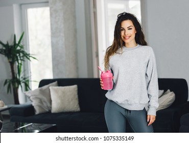 Beautiful Fit Woman Drinking Protein Shake