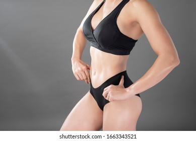 Beautiful Fitness Body Builder Woman In Studio 