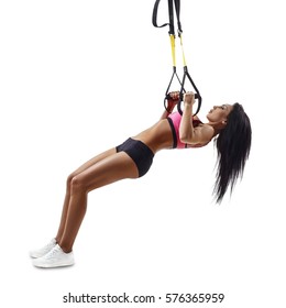 Beautiful Fitness Woman Do Inverted Row With Trx Suspensions. Workout.