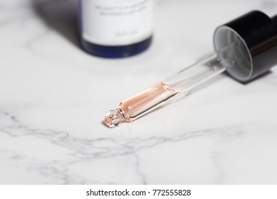 Beautiful Flat Lay Skin Care Pink Serum Liquid Dropper Minimal White Background