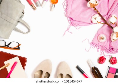 Beautiful flatlay frame arrangement with backpack, cosmetics, planner and other business and fashion feminine accessories. Mockup, white background, copyspace
