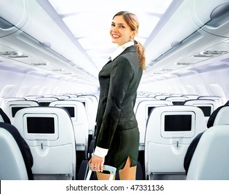Beautiful Flight Attendant On Board Of Big Plane