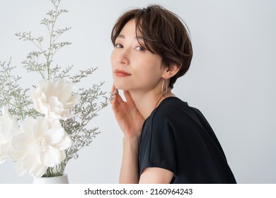 Beautiful flowers and portraits of beautiful Japanese women - Shutterstock ID 2160964243