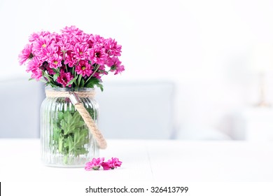 Beautiful Flowers In Vase On Table In Room