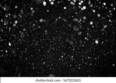 Beautiful Flying Heavy Snow On A Black Background Of The Night Sky