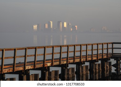 Beautiful Foggy Tampa Morning With Dock Architecture And Sunrise